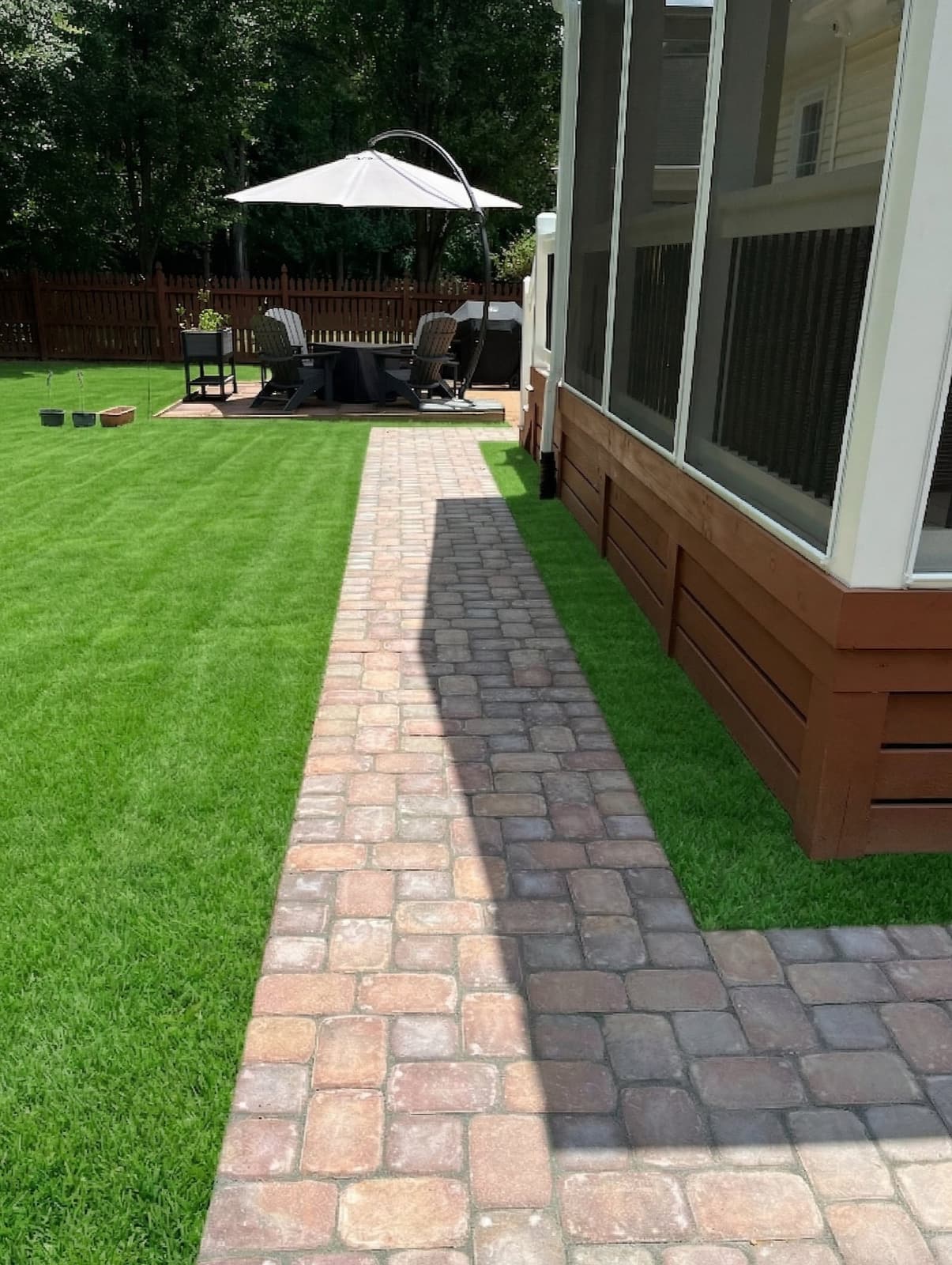 Paver surface photographed along its slope, showing how water is shed